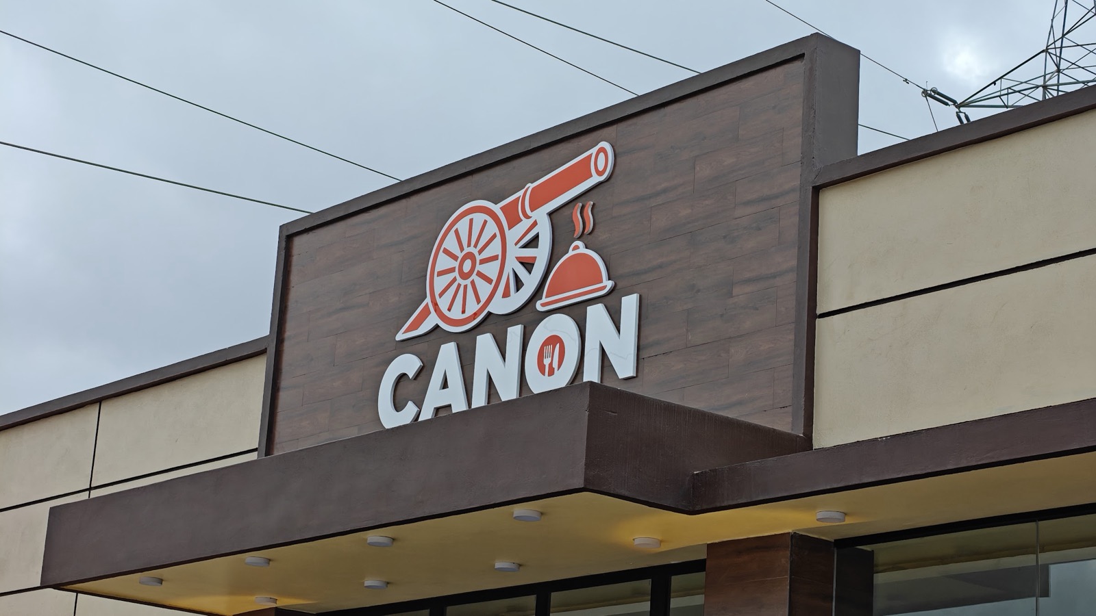 The Canon Food Court sign above the entrance